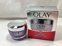 Olay Regenerist Night Recovery Cream jar and box showing product branding and packaging.