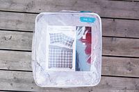 Clear plastic zipped storage bag containing the bed linen set, showing product image of blanket and pillow cover on packaging.