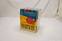 Outer box of Lotus SmartSuite Upgrade 4, showing it as an upgrade for personal computer software with emphasis on Lotus 123 Release 4.