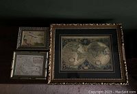 Full view of all three framed maps laid side by side showing size differences and framing styles.
