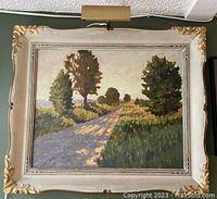 Full view of oil painting and frame