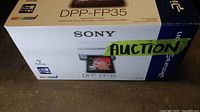 Sony DPP-FP35 digital photo printer retail box showing product image and model number.