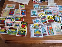 Photo of various vintage travel decals from US states and cities, colorful and mid-century style.