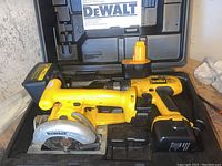 DeWalt cordless DW972 drill, DW930 trim saw in hard black case with battery packs