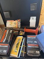 Remington 476 Power Hammer with boxes of Remington Power Fasteners and manuals displayed together
