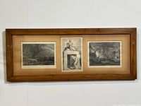 Wooden framed set of three antique etching prints, showing overall view including the surrounding wooden frame with scratches and wear.