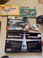 Overview of all 5 model kits including Star Trek, B-36 Peacemaker, F-106 Delta Dart, Boeing F4B-4, French Foreign Legion