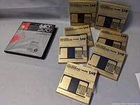 Seven boxed Ilford Todd-AO 1/4 inch magnetic tape reels and one BASF reel in black case