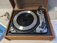 Angled top-down view showing platter, tonearm, cartridge mounted and plinth