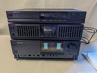 Front view of the full Nikko stereo stack showing tuner on top, equalizer in middle, amplifier on bottom.