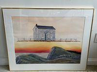Full framed watercolor painting showing floating grey house above coastal cliffs with sunset sky