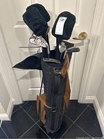 Full view of stand bag loaded with clubs and headcovers
