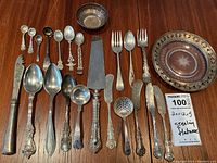 Overview of all silver flatware, dishes and box