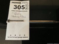 Full-length view of pen on MaxSold notes and measurements card