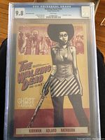 Front of CGC slab showing cover art and grade label