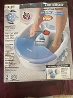 Box front of HoMedics UltraSpa Luxury Foot Bubbler showing product image, features, and branding.