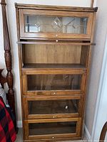 Front view of full five-tier oak bookcase