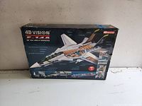 Box front displaying the F-14A VF-84 Jolly Rogers model with internal structure and features highlighted.