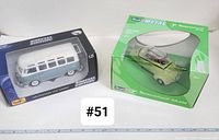 Volkswagen Van Samba model and Messerschmitt KR 200 boxed die-cast models side by side.
