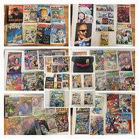 Overview of all comic books and magazines spread on floor showing a variety of collectible comics including MAD specials and others