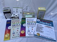 Overview of math bundle contents including Algebra workbooks, flash cards, and Electronic FlashMaster device.
