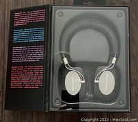 Bowers & Wilkins P5 headphones in original packaging showing sealed-leather ear cups and metal frame.