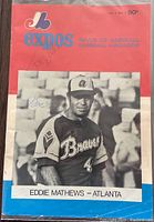 Front cover of 1972 Montreal Expos baseball program featuring Eddie Mathews, autographed by Bob Bailor and Tom Walker.