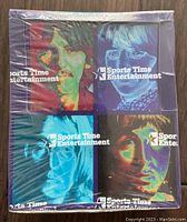 Front of the unopened trading card box with psychedelic pop-art portraits of The Beatles members.