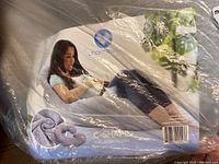 Packaged Pharmedoc C-Shaped Full Body Pillow with branding and usage image on packaging.