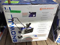 Front of original Snow Joe box showing model artwork, branding and 24×19×21 sticker