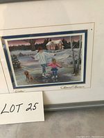 Framed print showing a winter scene with a woman, child, and dog ice skating, signed Patricia Bourque.