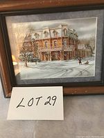 Framed print showing the winter scene artwork with building and snow, including Lot 29 card
