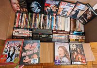 Large boxed lot of assorted DVD movies and TV series including titles such as Grease, No Mercy, Elizabeth November and Star Wars Episode I.