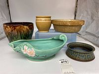 Photo showing all five pottery pots and decorative bowls in lot