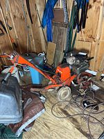 Full view of Simplicity Rotatiller showing handle, frame, and front tire.