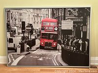 Full view of framed photo art showing red double decker bus in London street scene with Fortnum & Mason store visible