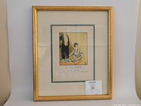 Front view of the framed lithograph showing gold painted frame and double mat