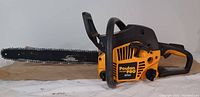 Right side view of Poulan Pro chainsaw showing Poulan Pro logo and 42cc engine label.
