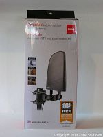 Front view of the sealed retail packaging for RCA amplified indoor/outdoor HDTV antenna showing model and key features.