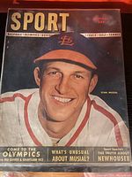 Front cover close-up with Stan Musial in a St. Louis Cardinals baseball cap and jersey, showing headline text and details.