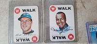Front of two Walk baseball player game cards showing Bill Parker and Tommy Davis portraits and autographs.