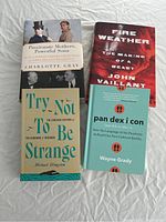 Four books laid flat showing front covers: Passionate Mothers, Powerful Sons by Charlotte Gray; Fire Weather by John Vaillant; Try Not to Be Strange by Michael Hingston; Pandexicon by Wayne Grady.