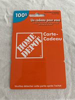 Photo of the $100 Home Depot gift card in its original orange packaging with French text, showing no visible damage or use.