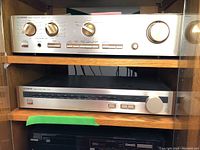 Front view of both amplifier and tuner stacked