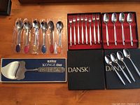 Full view of all flatware and cheese server laid out on table