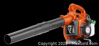 Side view of orange and gray blower with black nozzle and ergonomic handle