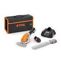 Front view of Stihl GTA 26 garden tool kit showing tool, battery, charger, attachments and case
