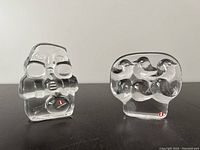 Both glass art pieces side by side showing size and shape.