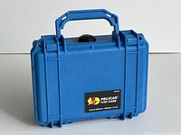 Front view showing Pelican 1120 case closed with handle and latches visible.