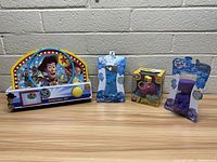 Full photo showing Toy Story basketball set, Foam Alive foam doughs and Spongebob Push 'N Go toy